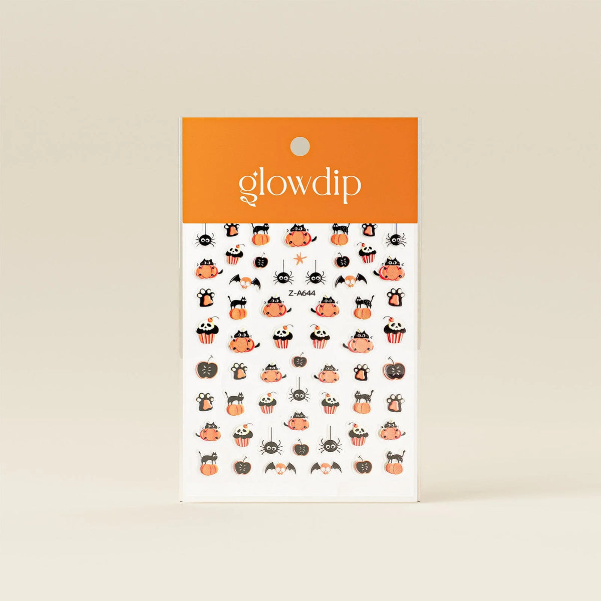 Oranje-wit glowdip halloween stickerpakket met glow-in-the-dark nagelstickers van zwarte katten pompoenen en vleermuizen