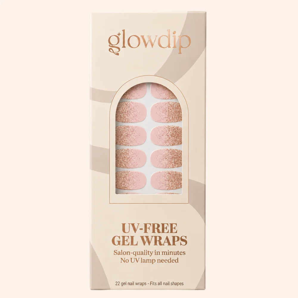 Een doos glowdip uvvrije gel nagelwraps met roségouden glitterafwerking op een zachte roze basis sparkles ombre