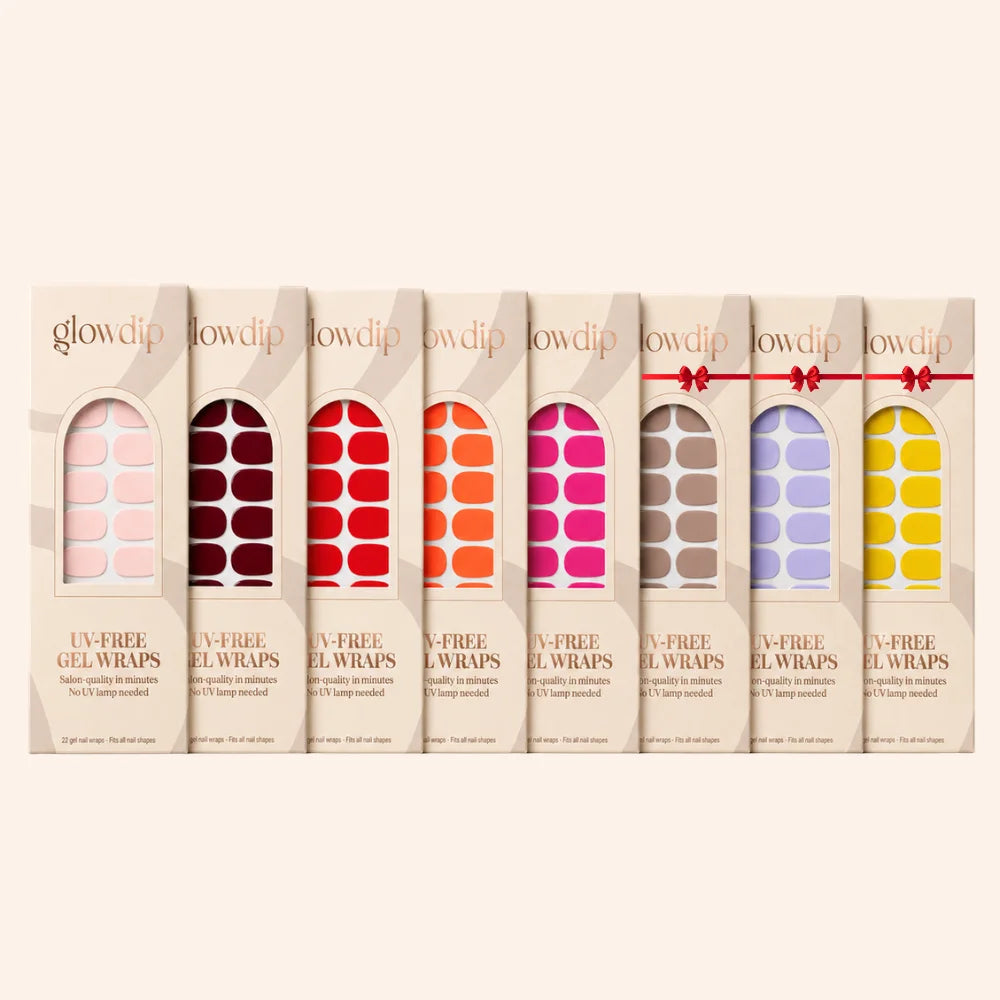 Een set van zeven glowdip uv-vrije gel wraps in pastel en felle kleuren verpakt in beige dozen met raampjes