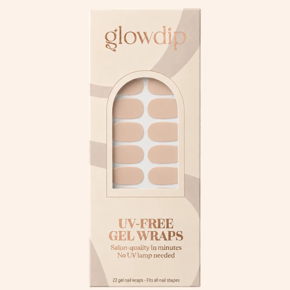 Beige vanilla nude uv-free gel nail wraps in sleek minimalist packaging with arched window showing neatly arranged nails