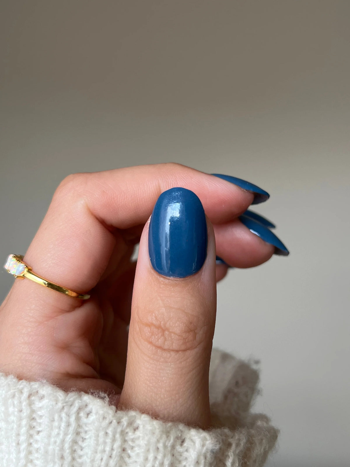 Limited edition 10 moon glow dipping powder deep blue glossy nail polish on neatly manicured fingers
