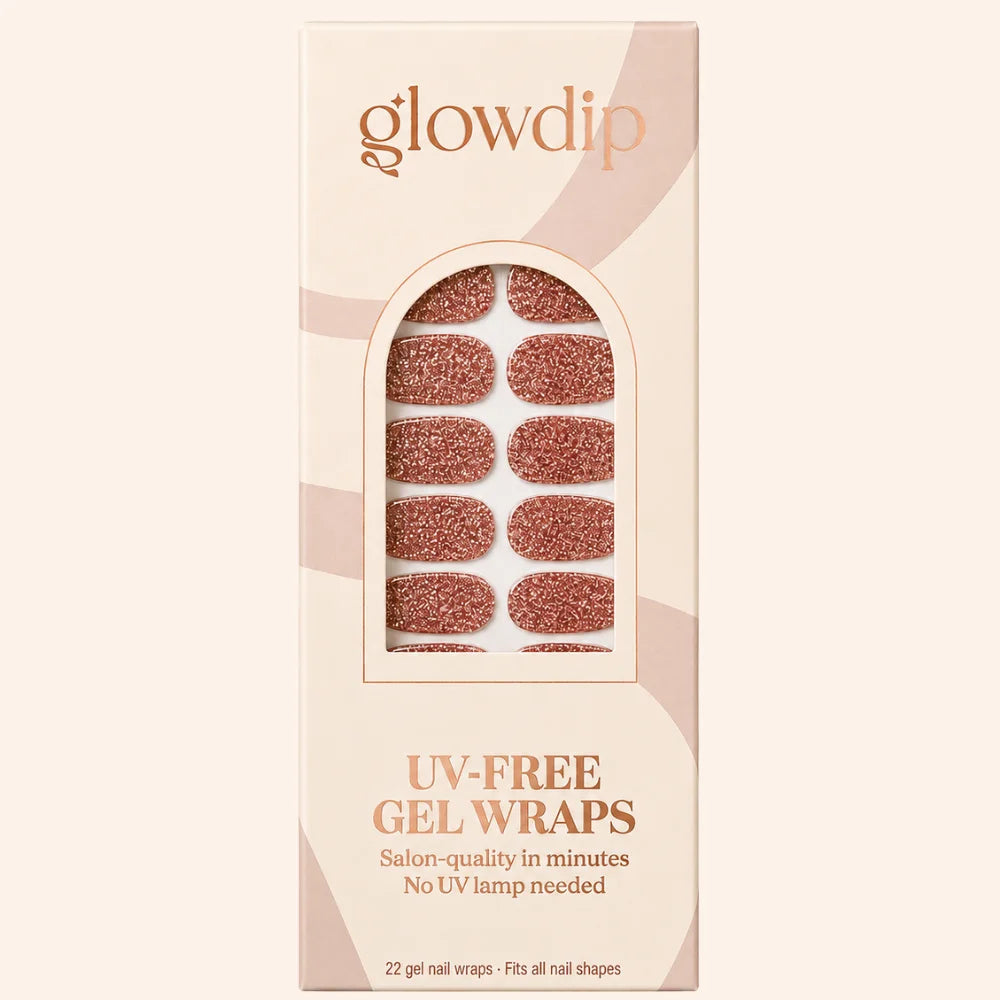 Een doos glow dip uv-vrije gel nagelwraps in een glinsterende roségouden glitterafwerking blush galaxy uv-vrije gel wrap